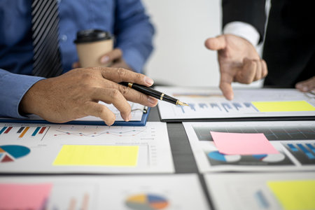 Executives are meeting with the department manager to summarize the company's monthly performance, summarizing meetings and brainstorming to help the company grow. Concept of business administration.の写真素材