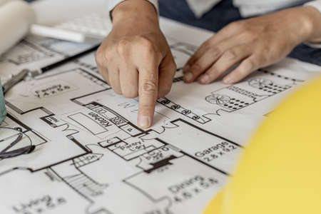 The architects reviewed the blueprints that were designed before the presentation, designed the house according to the homeowner's requirements and in accordance with the construction standards.の写真素材