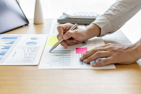 The sales manager is checking the monthly employee sales data for accuracy before paying the...