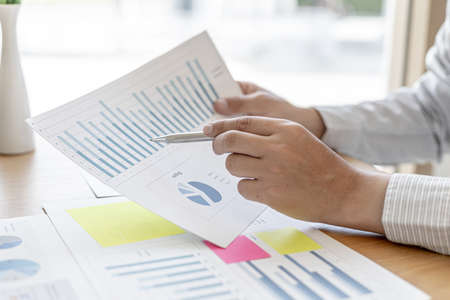 The sales manager is checking the monthly employee sales data for accuracy before paying the...