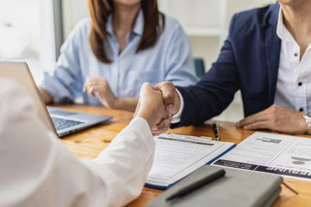 Managers and job applicants shake hands after the job interview, job interviews to find people to work with the company and talent to work with. Concept of recruitment and job interviews.の写真素材