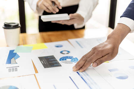 Atmosphere in the meeting room of startup companies, executives and marketing departments are discussing and brainstorming online marketing plans. Marketing management concept of startup company.の写真素材