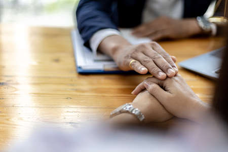 Attorneys or lawyers are advising clients in defamation cases, they are collecting evidence to bring charges against the parties for damages. The concept of defamation case counseling.の写真素材