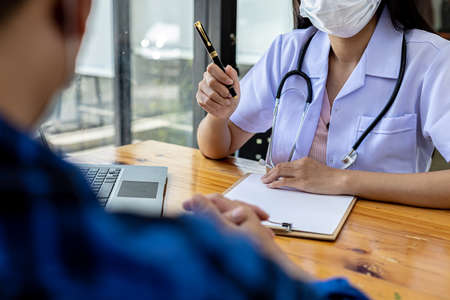 The doctor and the patient are discussing the details of the treatment, the results of the physical...