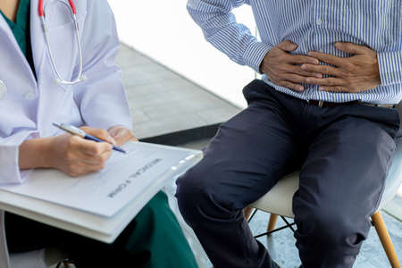 An examination room atmosphere in a hospital where doctors and patients are examining and diagnosing...