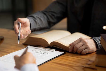 Client was listening to a lawyer advising on an embezzlement case, explaining the details of the...