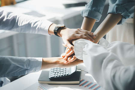 Coordination of the startup management team, businessmen joint venture start up companies, they are...