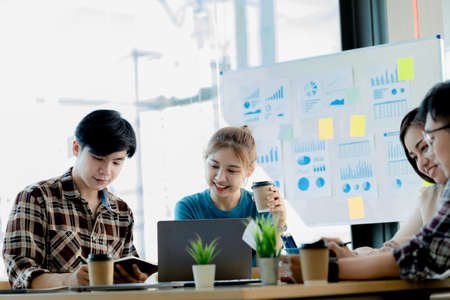 Company meeting rooms have employees attending, they are having a brainstorming meeting, planning meetings to manage the company's growth and profit. Management concept from the new generation.の写真素材