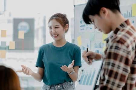 Meeting rooms where people are giving presentations, they are having a brainstorming meeting, planning meetings to manage the company's growth and profit. Management concept from the new generation.の写真素材