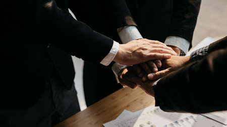 Coordination of the startup management team, businessmen joint venture start up companies, they are young entrepreneurs start up companies. up together to manage a plan to make the company profitable.の写真素材