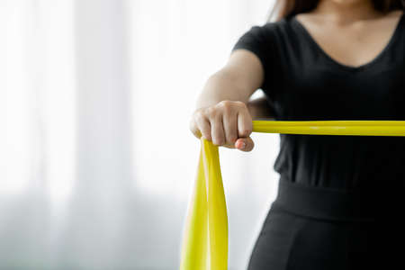 Physiotherapist is doing physical therapy for a patient, the patient has body aches due to overwork and has undergone treatment and physiotherapy with a professional physiotherapist.の写真素材