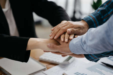 Coordination of the startup management team, businessmen joint venture start up companies, they are...