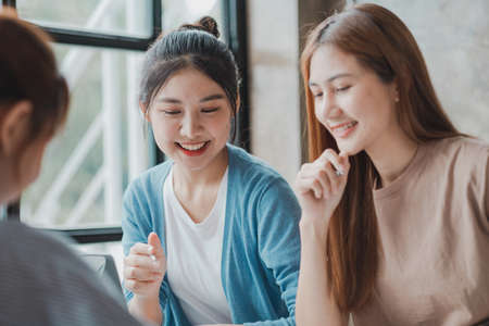 Groups of people gathered in the conference room, they were having a brainstorming meeting and planning meetings to manage the company's growth and profit. Management concept from the new generation.の写真素材