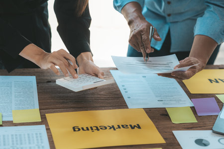 The meeting room for startup companies, the marketing department has a meeting to plan marketing and summary of the department's performance, a meeting to analyze the company's target customers.の写真素材