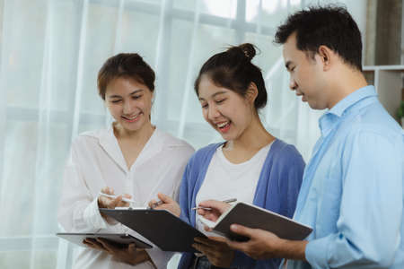 Groups Asian people chatting, business men and women meeting in a conference room, young business...