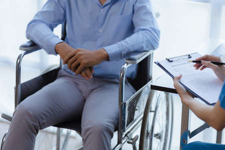 Doctors are giving advice on treatment to patients in hospital examination rooms, treating diseases...