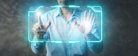 People are working on futuristic innovations, virtual screen holographic graphics, using modern technology to facilitate work, artificial intelligence concept.の写真素材