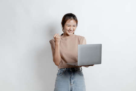 Beautiful Asian woman gesturing for advertisement editing on isolated background, portrait concept used for advertisement and signage, isolated over white background, copy space.の写真素材