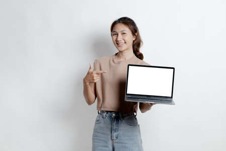 Beautiful Asian woman gesturing for advertisement editing on isolated background, portrait concept...