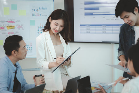 A group of startup management people are having a brainstorming meeting in the conference room, with supervisors and employees meeting and solving problems. Company management concept.の写真素材