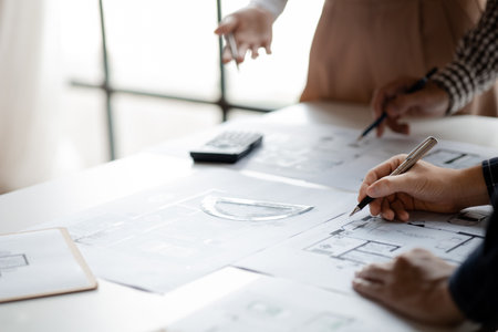 Architects and engineers are working together to edit the draft house plan that was designed after it was presented to the client and partially revised the design. Interior design and decoration ideasの写真素材