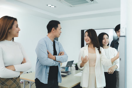 A group of startup management people are having a brainstorming meeting in the conference room, with supervisors and employees meeting and solving problems. Company management concept.の写真素材