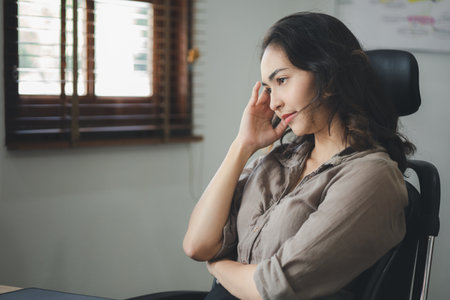 Asian women working in the office, young Asian business women as business executives, founding and running start-up executives, young female business leaders. Startup business concept.の写真素材