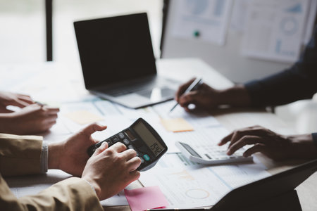 Group business people are having a meeting and planning their business together in the conference room, leaders of startup companies share their opinions and discuss how to run a successful business.の写真素材