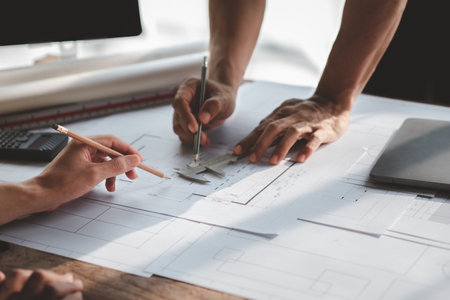 Architects and engineers are working together to edit the draft house plan that was designed after it was presented to the client and partially revised the design. Interior design and decoration ideasの写真素材