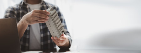 Architects and engineers are working together to edit the draft building plan that was designed after it was presented to the client and partially revised the design. Interior design and decoration ideasの写真素材