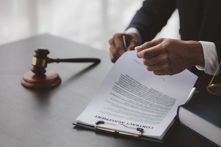 Attorneys or lawyers are advising clients in defamation cases, they are collecting evidence to bring charges against the parties for damages. The concept of defamation case counseling.の写真素材