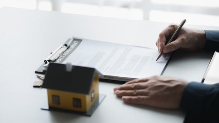 House sales representatives, sales representatives recommend housing details in the project to customers who are interested in viewing the houses in the project. Real estate trading concept.の写真素材