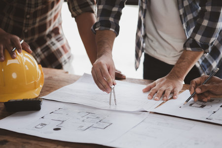 Architects and engineers are working together to edit the draft house plan that was designed after it was presented to the client and partially revised the design. Interior design and decoration ideasの写真素材