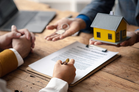 House sales representatives, sales representatives recommend housing details in the project to customers who are interested in viewing the houses in the project. Real estate trading concept.の写真素材