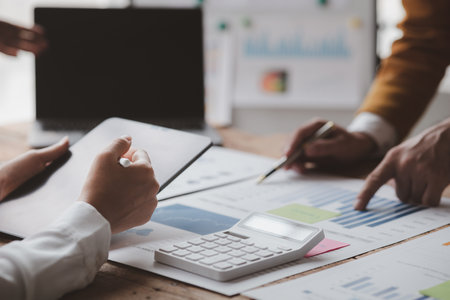 The meeting room for startup companies, the marketing department has a meeting to plan marketing and summary of the department's performance, a meeting to analyze the company's target customers.の写真素材