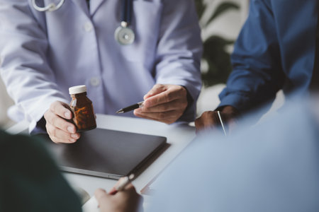 Conference room in the hospital, a group of doctors attending a meeting of drug presentations, a meeting of executive doctors and chiefs meeting with drug dealers. Doctor meeting concept.の写真素材
