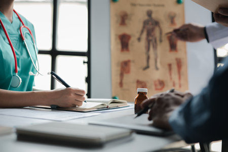 A conference room in a hospital where a group of doctors are attending a meeting, a meeting of executive doctors and chiefs meeting with pharmaceutical dealers. Doctor meeting concept.の写真素材