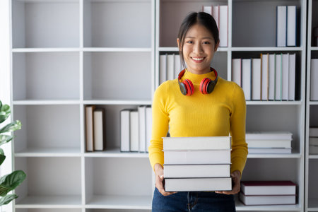 Woman in the library, she is reading and choosing books in the library, studying in the library....