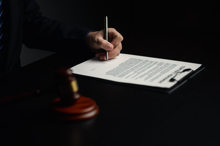 Lawyers, lawyers in the office and legal documents for use in arguing and planning cases for clients to win the case. Lawyer concept upholding the law and assisting clients in legal cases.の写真素材