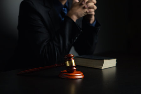 Lawyers, lawyers in the office and legal documents for use in arguing and planning cases for clients to win the case. Lawyer concept upholding the law and assisting clients in legal cases.の写真素材