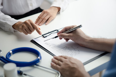 Doctors are giving advice on treatment to patients in hospital examination rooms, treating diseases from specialists and providing targeted treatment. Concepts of medical treatment and specialists.の写真素材
