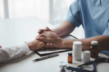 Doctors are giving advice on treatment to patients in hospital examination rooms, treating diseases from specialists and providing targeted treatment. Concepts of medical treatment and specialists.の写真素材