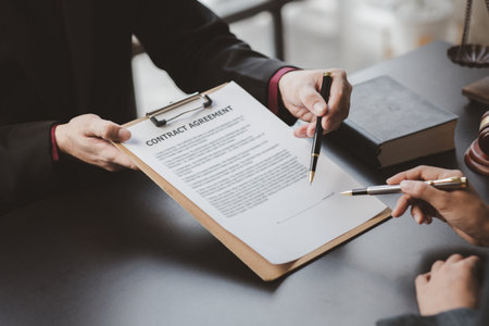Attorneys or lawyers are advising clients in defamation cases, they are collecting evidence to bring charges against the parties for damages. The concept of defamation case counseling.の写真素材
