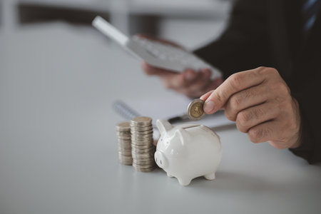 Individuals with savings, investing in stocks and funds to make money grow and generate profits in the future. The concept of personal finance and investment savings.の写真素材