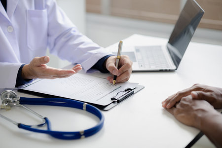 Doctor are recommending medicines to patients after being examined and diagnosed by the patient's...