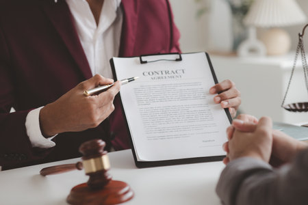 Attorneys advising in cases where a client has been defrauded by a defendant who is a business partner forming a joint company, advising on litigation and gathering evidence. Fraud case concept.の写真素材