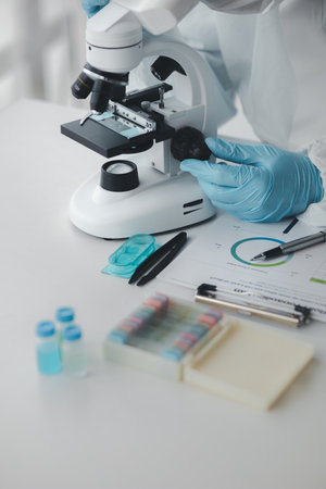 The laboratory is used for scientific research to test and research therapeutic vaccines, lab assistants collect blood samples from patients and perform chemical reactions. Laboratory concept.の写真素材