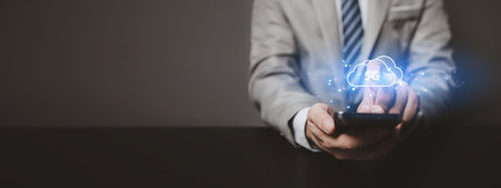 Businessman with 5g technology hologram, 5g networking, data forwarding and internet use efficiency and sensitivity of data forwarding through wireless network.の写真素材