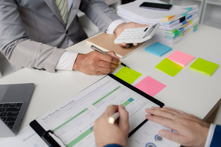 Meeting room atmosphere, business people meeting together on finance topics, they are working...