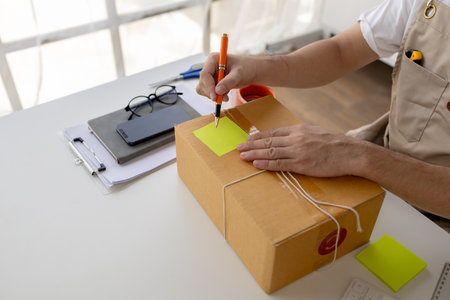 Owner of an online store on the website, online shop owner distributes products on website, packs...
